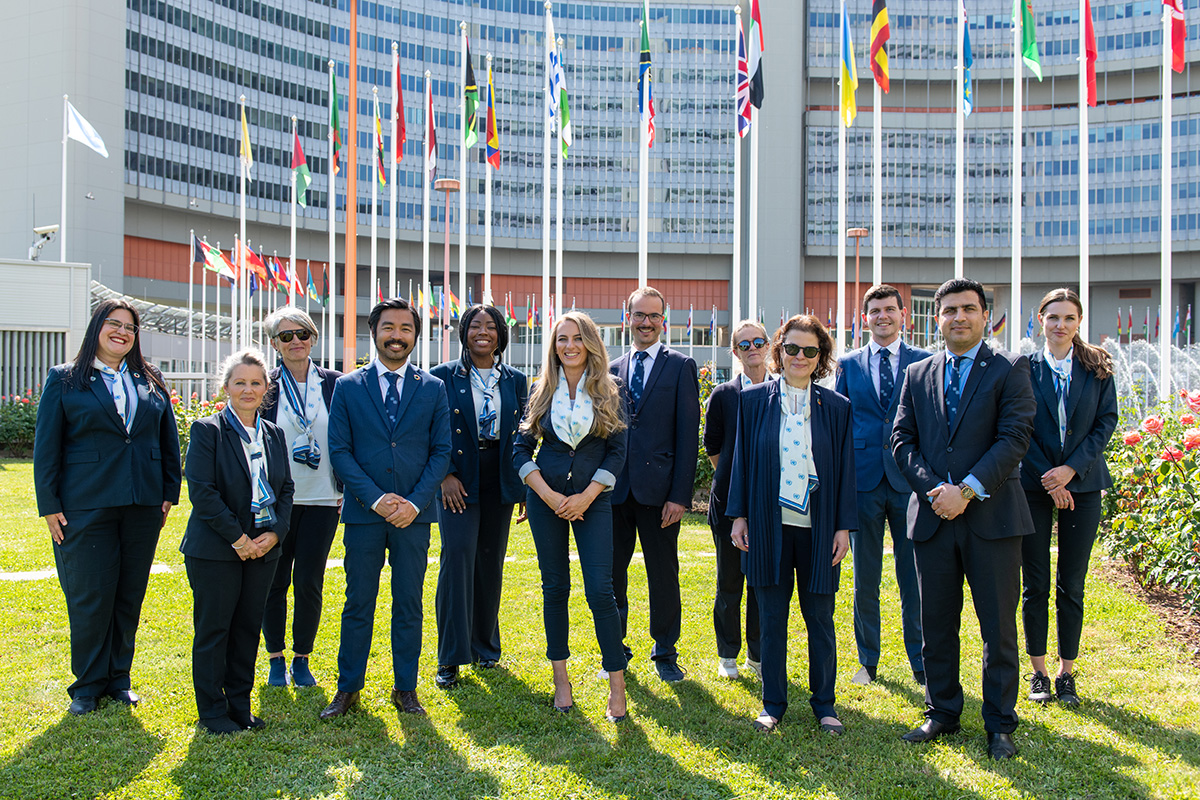 Director-General of the UN Office at Vienna (UNOV) Ghada Fathi Waly, with UN Vienna Tour Guides.
